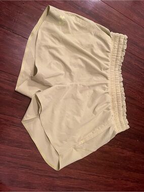 Nike Women's Pale Yellow Athletic Shorts